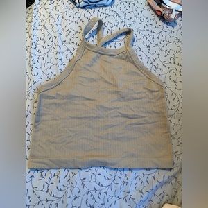 Khaki colored racer back crop top
